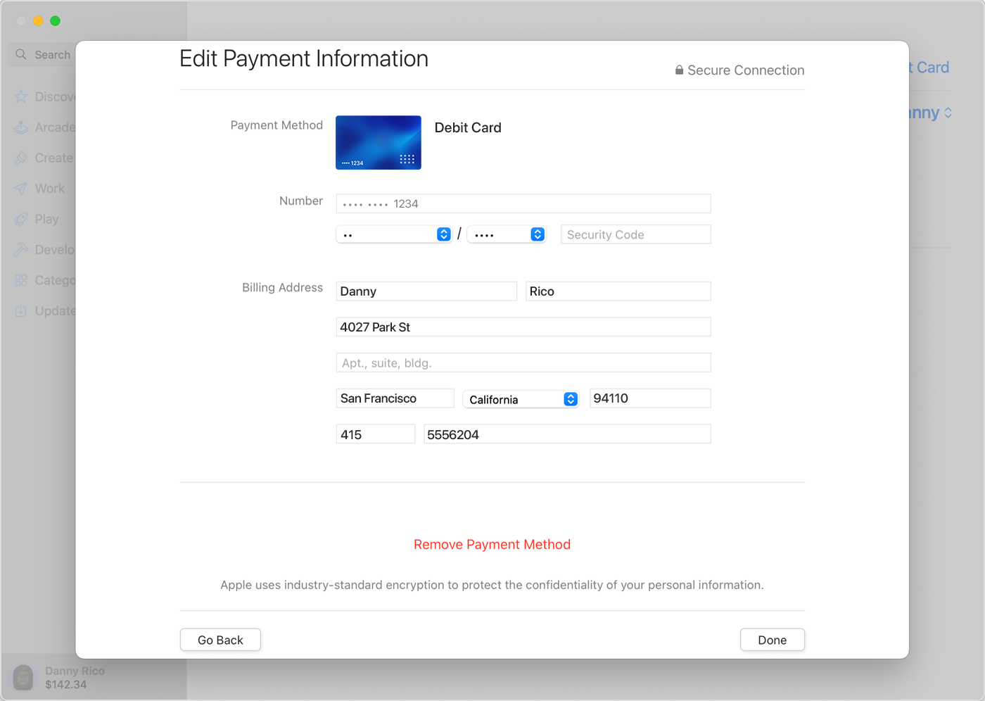 The App Store on Mac showing the Manage Payments page, highlighting where you can remove a payment method.