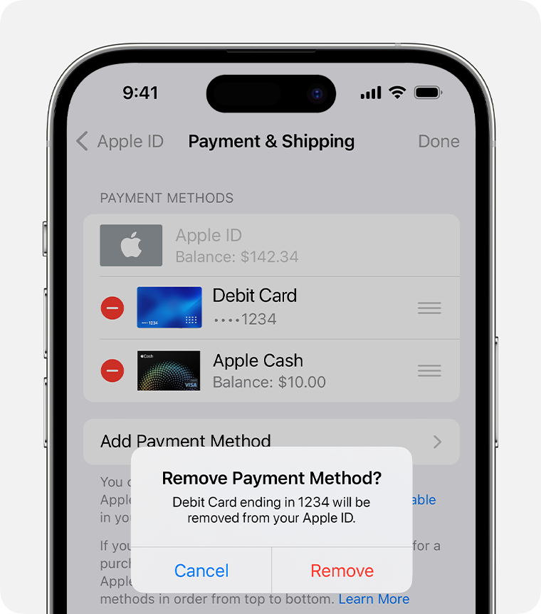 iPhone showing the Manage Payments screen with confirmation notification to remove payment method.